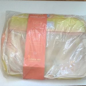 NWOT CALPAK 3 piece packing cubes